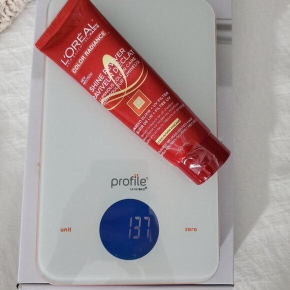 Hair Care Product Set with Red, Black, and White Packaging - Picture 13 of 14